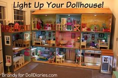 a doll house with lots of furniture and accessories in the room that says, light up your dollhouse