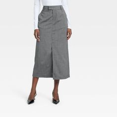 Move through your busy day in confident style in these Tailored Midi Skirt from A New Day™. Fashioned in a midi length, this mid-rise skirt made from midweight fabric with added stretch make a comfy addition to your wardrobe. It's designed with a fly zipper with back elastic for a secure fit and customizable wear. Boasting classic pinstripe pattern in gray, it pairs well with a wide range of tops for versatile styling. A New Day™: Style that goes wherever you do. Midi Skirt With Loafers, Corporate Skirt Styles, Skirt With Loafers, Gray Skirts, Pinstripe Pattern, Confident Style, London Christmas, Skirt Midi, Pretty Clothes