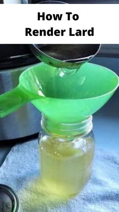 a jar filled with liquid sitting on top of a blue towel