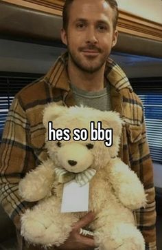 a man holding a teddy bear with the caption he's so bg