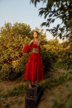 Red Colour Midi skirt- Gathered high-rise waist- Concealed zipper at the side- Straps with adjusters at the backCOMPOSITION: 100% polyesterMade in EnglandDry cleanModel is 5ft 9in and wears a size UK8Size Guide (in cm):UK4: Bust 76, Waist 58, Hip 83UK6: Bust 80, Waist 62, Hip 87UK8: Bust 84, Waist 66, Hip 92UK10: Bust 88, Waist 70, Hip 95UK12: Bust 92, Waist 74, Hip 99About Szabo SihagDesigner ready-to-wear label Szabo Sihag was established by Meghna Sihag and Krisztian Szabo in 2019. It is a Lo Red Maxi Skirt Outfit, Photoshoot Red Dress, Skirt Photoshoot, 2020s Fashion, Red Maxi Skirt, Luxury Clothing Brands, Mother Wedding, Maxi Skirt Outfits, Red Colour