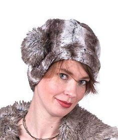 THE CUFFED PILLBOX is our best selling hat style. Handmade in Seattle, WA, USA. This hat is shown in Luxury Faux Fur in Birch (Shown with an Arctic Fox Pom). Available in solid styles or in two-tone, reversible styles. This is a soft and flexible hat with a snug fit. The crown height is 4 1/2" folded up (adjustable) and the diameter of crown is 8". Prices are as shown (Large Fox Pom Pom sold separately). Our one-size-fits-most Cuffed Pillbox offers a relaxed fit for 22" heads and a snug fit for Ruff Collar, Face Mask Men, Crown Heights, Cozy Coats, Hat Style, Arctic Fox, Pill Boxes, Scarf Men, Support Handmade