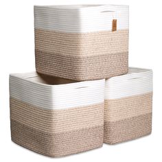 three baskets stacked on top of each other in different colors and sizes, one with a brown stripe