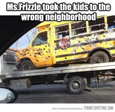 a yellow school bus is on the back of a flatbed truck and it's saying, ms frizzle took the kids to the wrong neighborhood