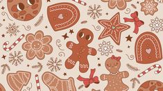 gingerbread cookies and candy canes are arranged on a beige background with stars, snowflakes, and hearts