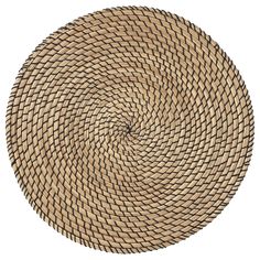 a round woven placemat on a white background, with the center circle made out of straw