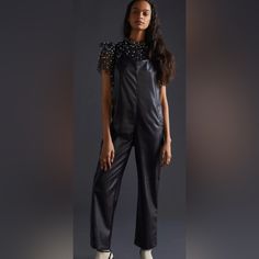 Anthropologie Faux Leather Jumpsuit Nwt Medium Lux Vegan Jumpsuit * Polyurethane * Side Slant Pockets * Pull-On Styling * Hand Wash * Imported Dimensions * 53"L* 24" Inseam * 16" Leg Opening Jumpsuit Overalls, Leather Jumpsuit, Black Vegan, Overalls Women, Tie Knots, Rompers Women, Jumpsuits For Women, Pant Jumpsuit, Vegan Leather