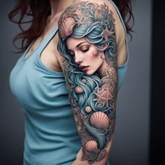 a woman with a tattoo on her arm is holding a seashell in her hand