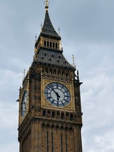 the big ben clock tower towering over the city of london