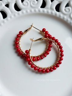 COMES IN THE GIFT BOX READY TO SHIP WITHIN 1 WORKING DAY  Stylish red coral gold hoop earrings.  These gold hoop base earrings are made of natural quality red coral beads.  Size - 3.5 cm. I will be very glad if these earrings will bring you joy and pleasure!  I will be happy to answer all your questions, do not hesitate to write to me. To view the entire collection of earrings: https://www.etsy.com/shop/TatPetrenkoffJewelry?ref=seller-platform-mcnav§ion_id=24050791 For more ideas, please visit TatPetrenkoffJewelry shop: https://www.etsy.com/shop/TatPetrenkoffJewelry Thank you for browsing! Red coral earrings Long Crystal earrings Drop Chandelier Dangle Silver Bridesmaid Wedding Jewelry Gemstone Birthday Gift for her Bridesmaid Teardrop Sparkle Jewelry Gemstone Earrings Gift for her Bridal Handmade Red Jewelry For Birthday Gift, Red Jewelry For Christmas Birthday, Red Hypoallergenic Jewelry For Party, Red Hypoallergenic Party Jewelry, Hypoallergenic Red Round Jewelry, Hypoallergenic Red Jewelry For Parties, Nickel Free Red Hoop Earrings, Nickel-free Red Hoop Earrings, Adjustable Red Hoop Earrings