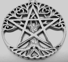 a silver pentagramil pendant with an inverted design on the front and back side