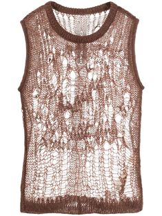 a women's top with crochet on it