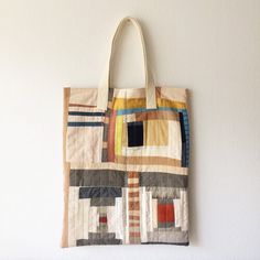 a tote bag hanging on the wall