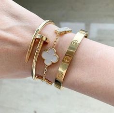 Single available or set. Set in gold. Allow 2-5 business days for delivery Van Arpels Jewelry, Bracelet Stack Van Cleef, Designer Bracelet Stack Gold, Van Cleef Arpels Bracelet White Gold, Dream Bracelet Stack, Stacking Cartier Bracelets, Stacked Cartier Love Bracelets, Can Cleef Bracelet Stack, Van Cleef And Arpels Aesthetic