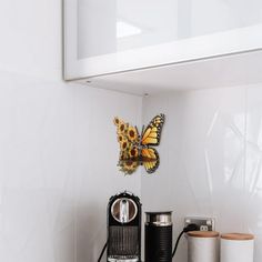 a coffee maker sitting on top of a counter