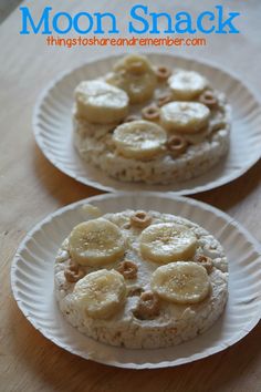 two white plates topped with cookies and banana slices on top of a wooden table next to each other