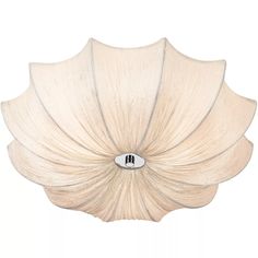 a large white flower shaped light fixture