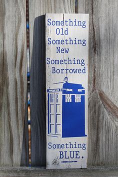 a sign on a wooden fence that says something old something new something borrowed something blue