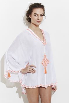 Atlas tunic gives a prominent beach holiday vibe with its youthful hood and cap sleeves. Great to be worn as a swim cover up, or pair it with shorts or jeans. This unique tunic is ultra soft, made from the finest Egyptian cotton. 100% Cotton One Size Dry Clean Made in Morocco MAISON DU CAFTAN Beachwear Tops With Upf 50+ Protection, Beachwear Tops With Upf 50+ For Beach, Beachy Upf 50+ Tops For Spring, Upf 50+ Beach Tops, Beachwear Tops With Upf 50+ For Vacation, White Cover-up For Beach Season, White Beachwear Cover-up For Warm Weather, Beachwear Cover-up For Vacation, Beachwear Tops With Upf 50+ For Beach Season