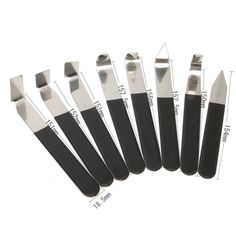 six pieces of black and silver knifes with measurements