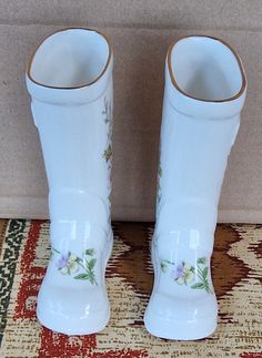 Aynsley Bone China psir of Wellington Boots in the lovely Wild Tudor pattern.  Ideal as bud vases or small herb pots. They are  5 inches tall, there is a left and right boot In excellent condition with no chips or cracks or crazing.   Dates from the 1990s Please note,  because Etsy fees are charged on shipping costs as well as the price of the item,  I cannot send outside Europe unless the order is £12 or more before shipping. Tudor Pattern, Welly Boots, Wellies Boots, Herb Pots, Wellington Boots, Bud Vases, Wellington, Collectible Figurines, Bone China