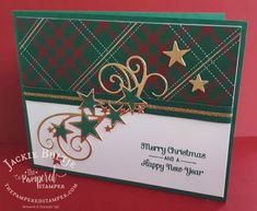 a christmas card with gold stars on it