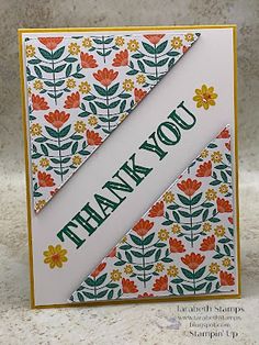 a thank you card with flowers on it