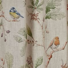 a curtain with birds and leaves on it