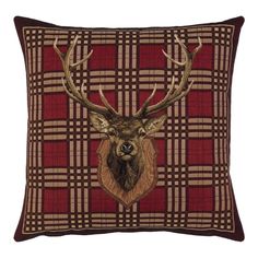 a red plaid pillow with a deer's head on the front and antlers on the back