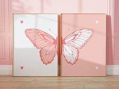 two pink and white butterfly prints in front of a pink wall