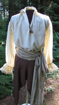 Fantasy Clothes Male Poor, Pirate Undershirt, Simple Medieval Outfit Male, Mens Ren Faire Outfit Pirate, Medieval Mens Outfit, Mid Evil Outfits Men, Ren Fair Male Outfit, Commoner Clothing Male, Pirate Male Costume