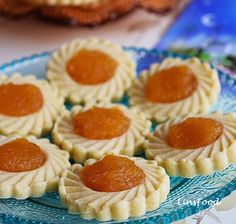 some small cookies are on a blue plate