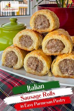 sausage rolls on a plate with the title italian sausage rolls in easy parmesan pastry