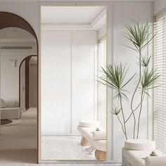 an open door leading to a bathroom with white walls and flooring, along with a potted plant in the corner