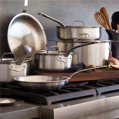 pots and pans are stacked on top of each other