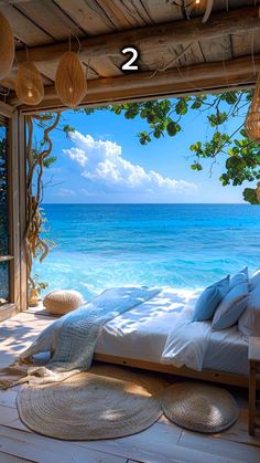 there is a bedroom with an ocean view