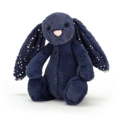 a blue stuffed rabbit with stars on its ears