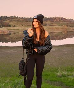 female native american model in upper bidwell park, chico, california wearing white high socks, black and white adidas running shoes, black lulu lemon leggings, a black leather puffer coat jacket zip-up, black cropped tank top with micro straps, small black backpack, and upper park clothing's moonlight patch beanie in black. nature photoshoot, state park photoshoot, golden hour model photoshoot, california sunset photoshoot, countryside photoshoot, countryside sunset, bidwell park, butte county Trendy Dress Outfits, Trendy Dresses, Winter Fashion, Dress Outfits