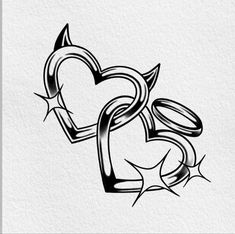 two heart shaped tattoos on white paper