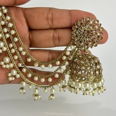 Restocked Bahubali Polki Pearl Jhumka/stone Jhumka/Indian Jewelry/Pakistani/Punjabi/Indian/Statement earring/Bridal earring/Indian wedding Can be paired with any dress Closure: Pushback This is 100% Handmade jewelry. So Color, shades, texture displayed may slightly vary from the actual product due to digital image limitations. We request you to consider these minor variations. Please expect the possibility of some slight imperfections when buying hand made jewelry. If you have any questions, ple Punjabi Jhumka, Wedding Temple Jewelry Metal Chandbalis, Bollywood Style Jhumkas For Diwali, Bollywood Chandbali Jhumkas With Tilla, Indian Jhumka, Heavy Bollywood Jhumkas For Diwali, Bollywood Style Chandbali Jhumkas With Tilla, Metal Chandbalis With Tilla For Wedding, Temple Jewelry Metal Danglers For Wedding