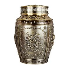 an ornate metal urn is shown against a white background