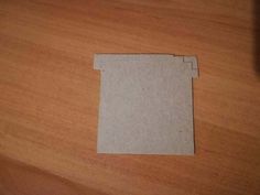 a piece of paper sitting on top of a wooden table