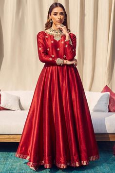 Exquisitely embroidered with hand & machine work, this red bangalori silk anarkali suit which exudes feminine charm.This round neck and full sleeve outfit prettified with zari and stone work.Present with lycra churidar in red color with red net dupatta.Churidar and dupatta is plain.This anarkali suit can be customised up to maximum size available in inches 58. Slight color variation may occur due to photographic reasons. Red Anarkali Suits, Red Anarkali, Silk Anarkali Suits, Eastern Dresses, Anarkali Dresses, Silk Anarkali, Long Frock, Trendy Dress Outfits, Wear Red