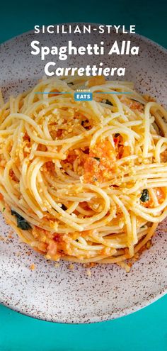 spaghetti with sauce and parmesan cheese on a plate