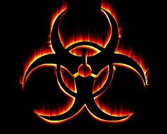 a red and yellow biohazard sign on a black background