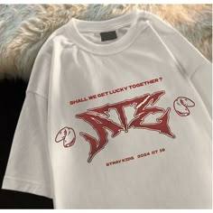 Skz Tshirt Design, White Kpop T-shirt For Streetwear, White Kpop T-shirt For Summer, White Kpop Style Top For Spring, White Kpop T-shirt With Graphic Print, Spring Kpop T-shirt With Graphic Print, Kpop Style Graphic Print T-shirt For Spring, Spring Kpop Style T-shirt With Graphic Print, White Kpop Style Tops With Letter Print