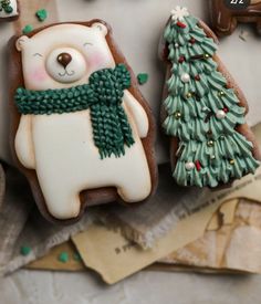 some cookies are decorated like bears and trees