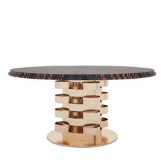 the table is made out of wood and has an intricate design on it's base