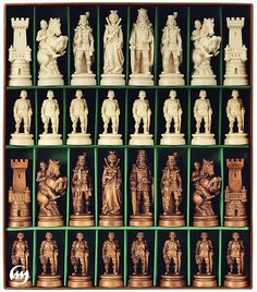 an assortment of wooden chess pieces on display