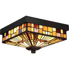 a square light fixture with stained glass shades